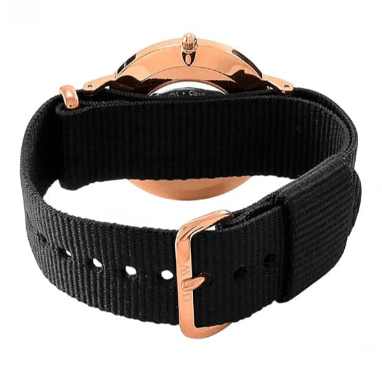 Black nylon strap with rose gold hardware and buckle closure, back view