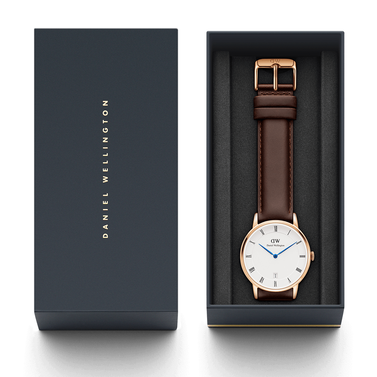 Daniel Wellington Dapper watch with packaging showing navy box and owner's guide included