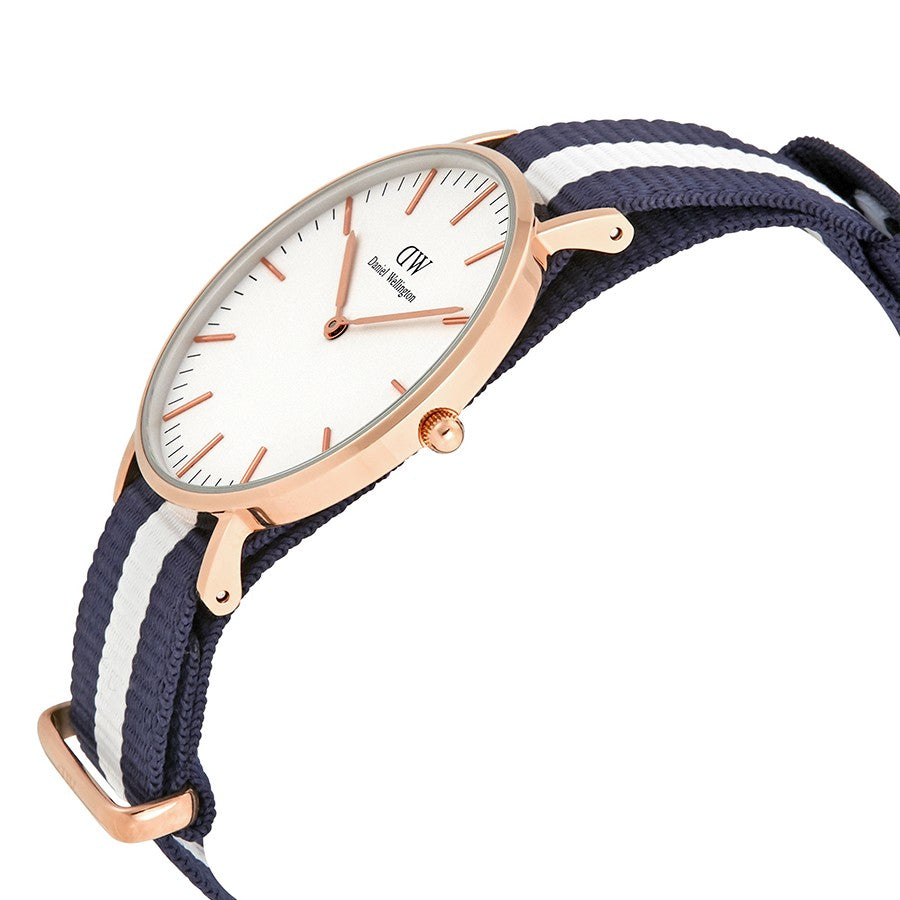 Side angle view of Glasgow watch showing rose gold case and striped navy-white strap