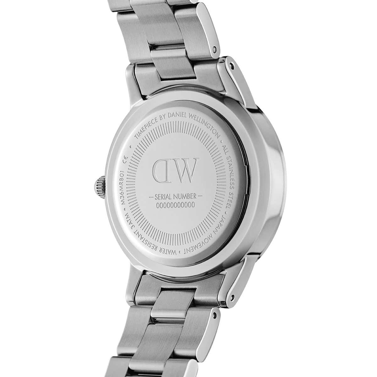 Daniel Wellington Iconic Link watch caseback showing logo and serial number engraving
