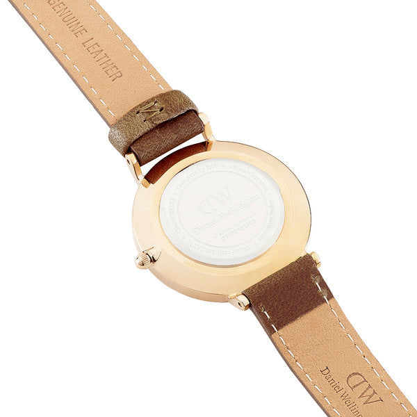 Daniel Wellington Petite Durham watch caseback displaying engraved branding and genuine leather strap