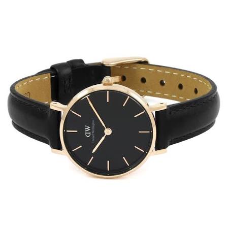Daniel Wellington Petite Sheffield watch worn on wrist showing rose gold case and black leather strap
