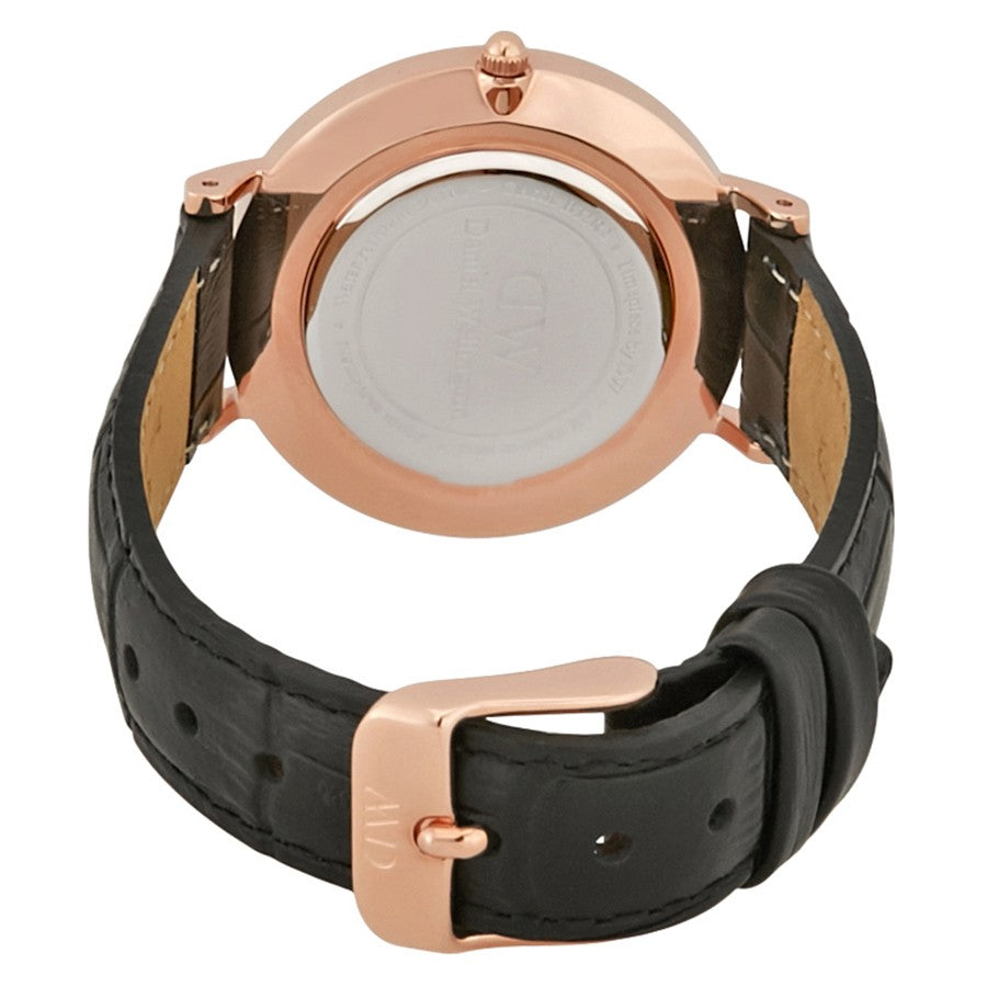 Caseback view of Daniel Wellington Reading watch showing rose gold case and black leather strap