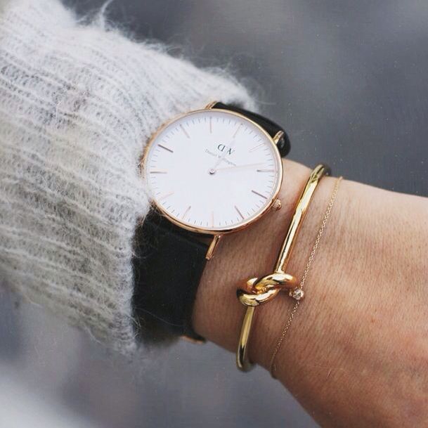 Daniel Wellington Sheffield 32mm watch worn on wrist with white dial and black leather strap