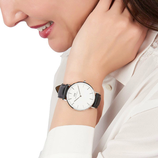 Daniel Wellington Sheffield watch on wrist showing minimalist white dial with silver hands
