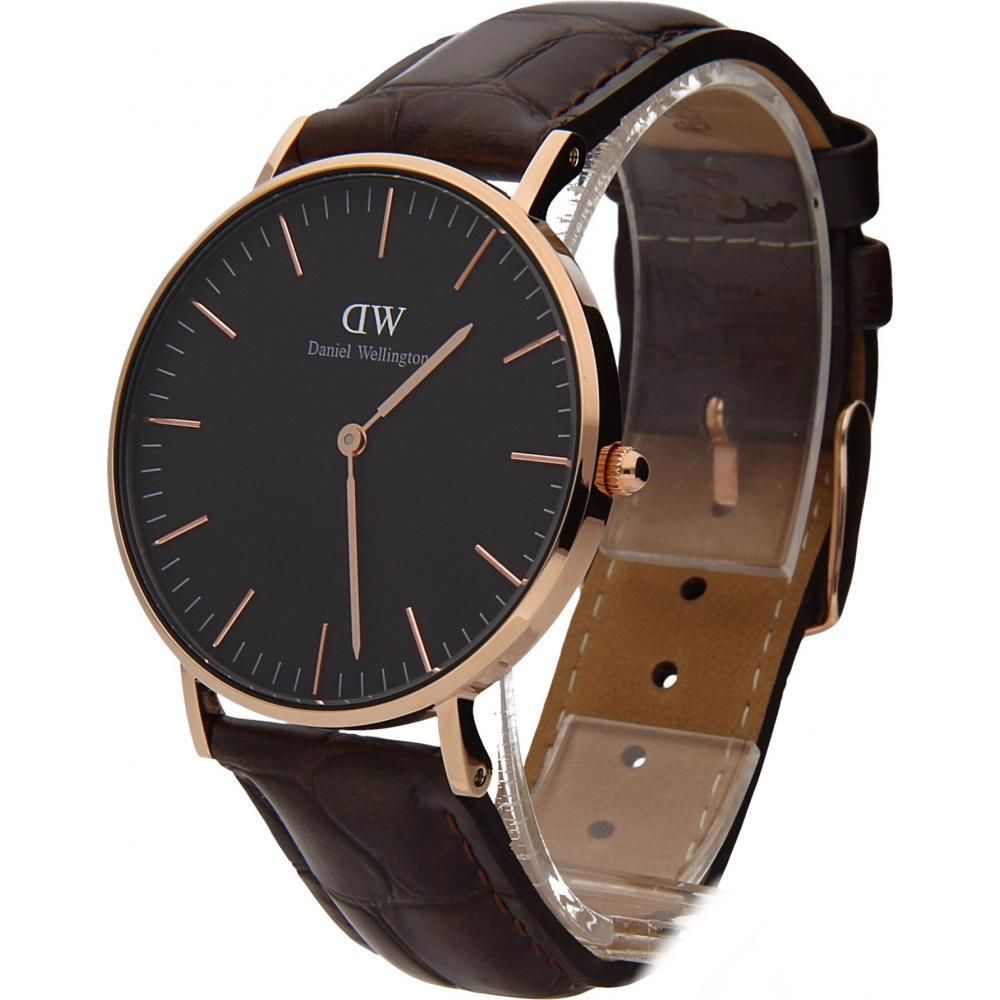 Daniel Wellington York watch side view showing rose gold case and brown crocodile strap