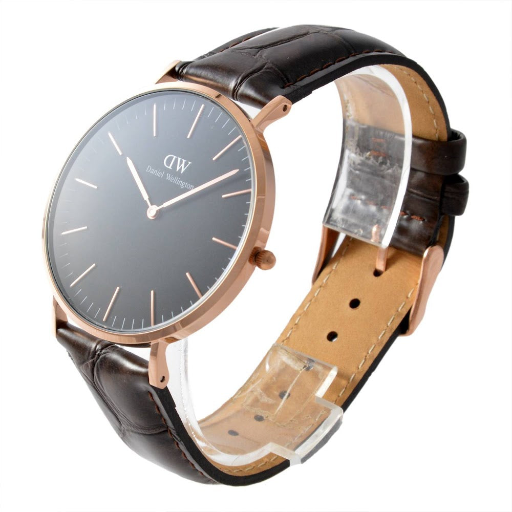 Daniel Wellington York gold watch side view showing black leather strap and case