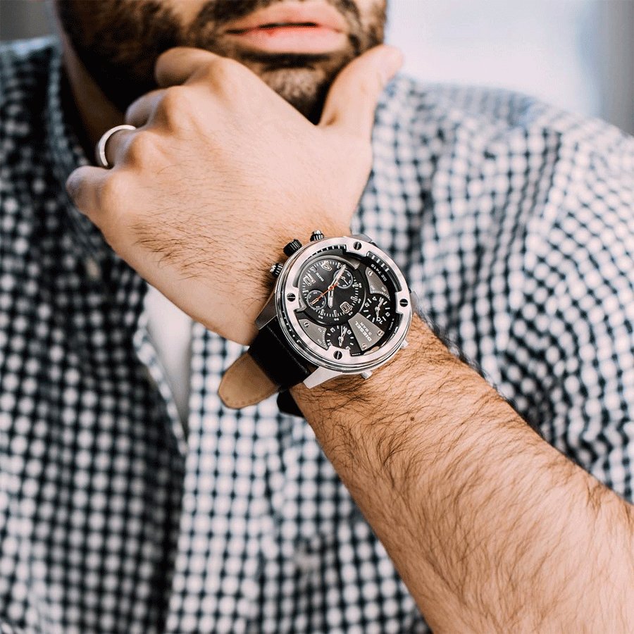 Diesel Boltdown DZ7415 chronograph watch worn on wrist with gray dial and dual time zone display