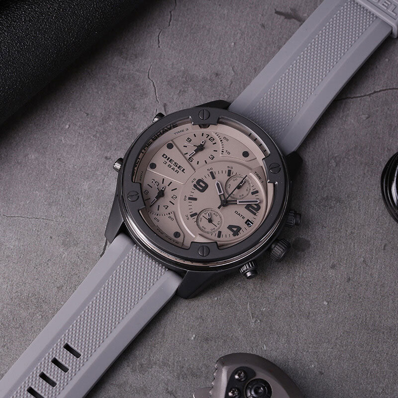 Diesel Boltdown DZ7416 watch with gray rubber strap on neutral surface