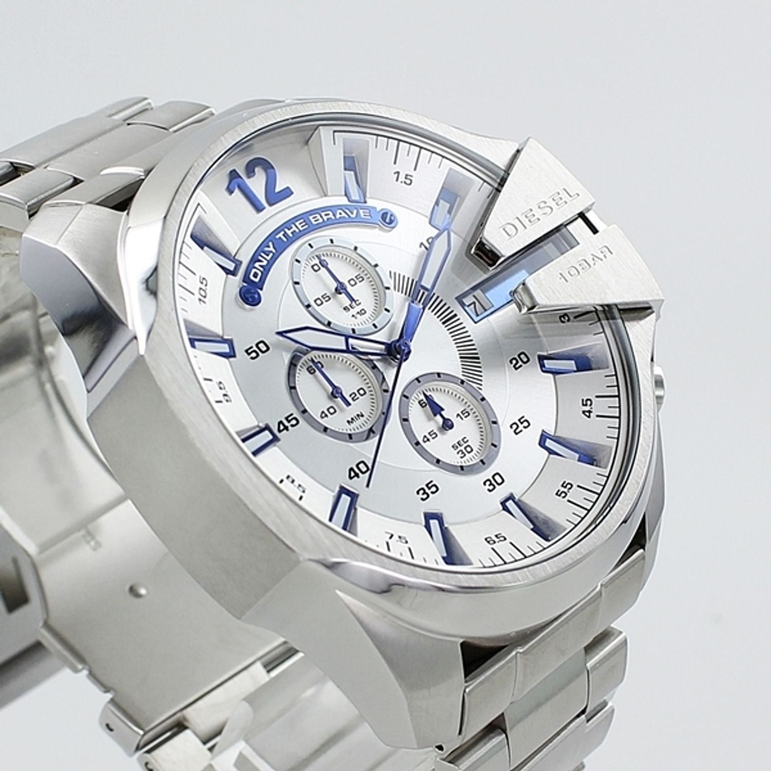 Diesel Mega Chief chronograph watch shown at angle with stainless steel bracelet and white dial
