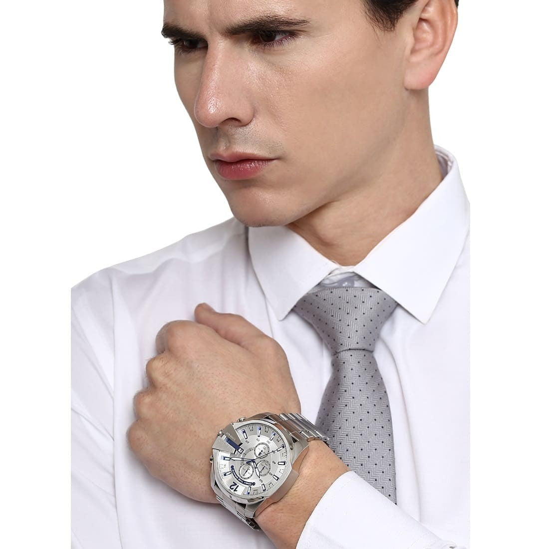 Diesel Mega Chief DZ4477 chronograph watch on man's wrist wearing white shirt and tie