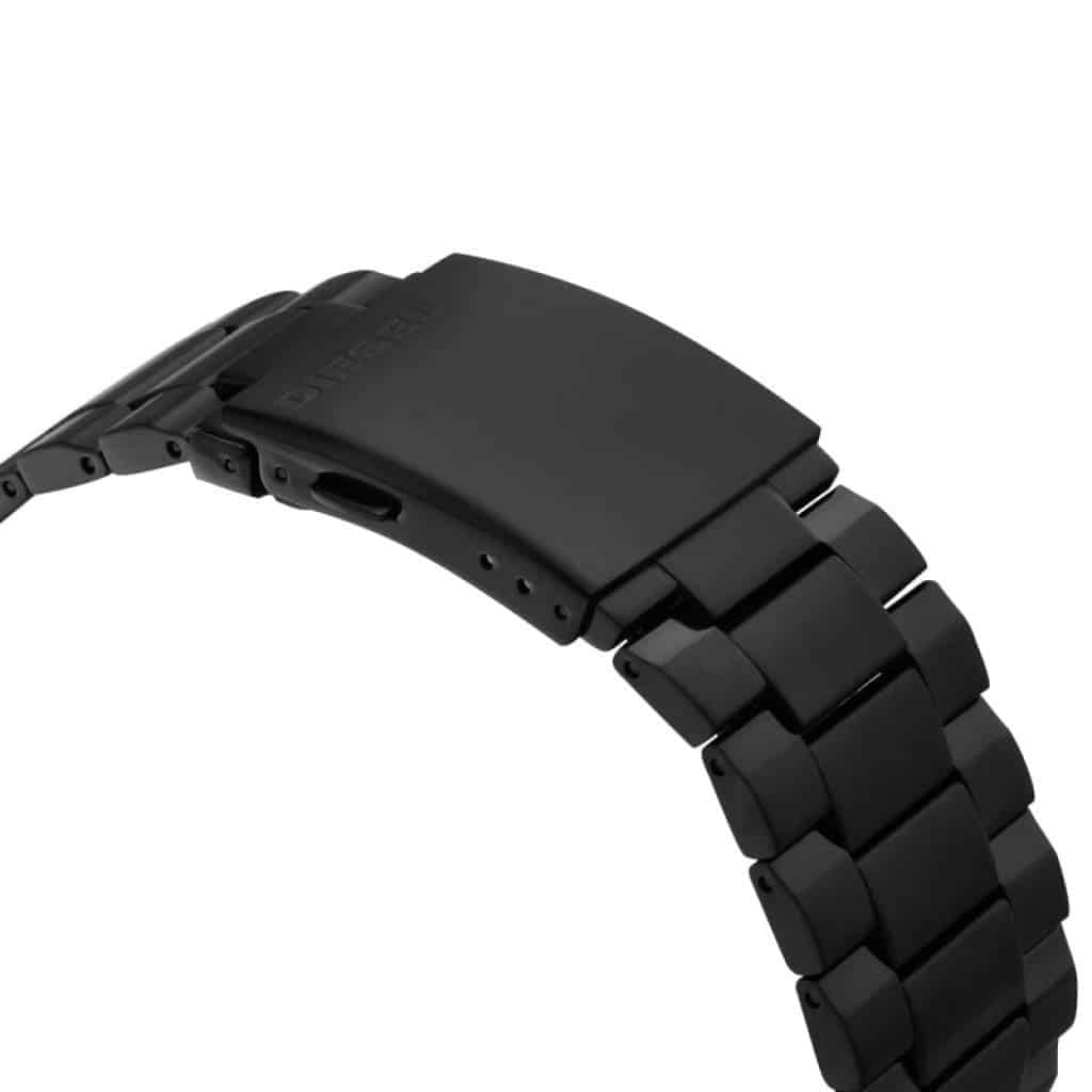 Close-up of black IP stainless steel bracelet with solid end links and deployant clasp