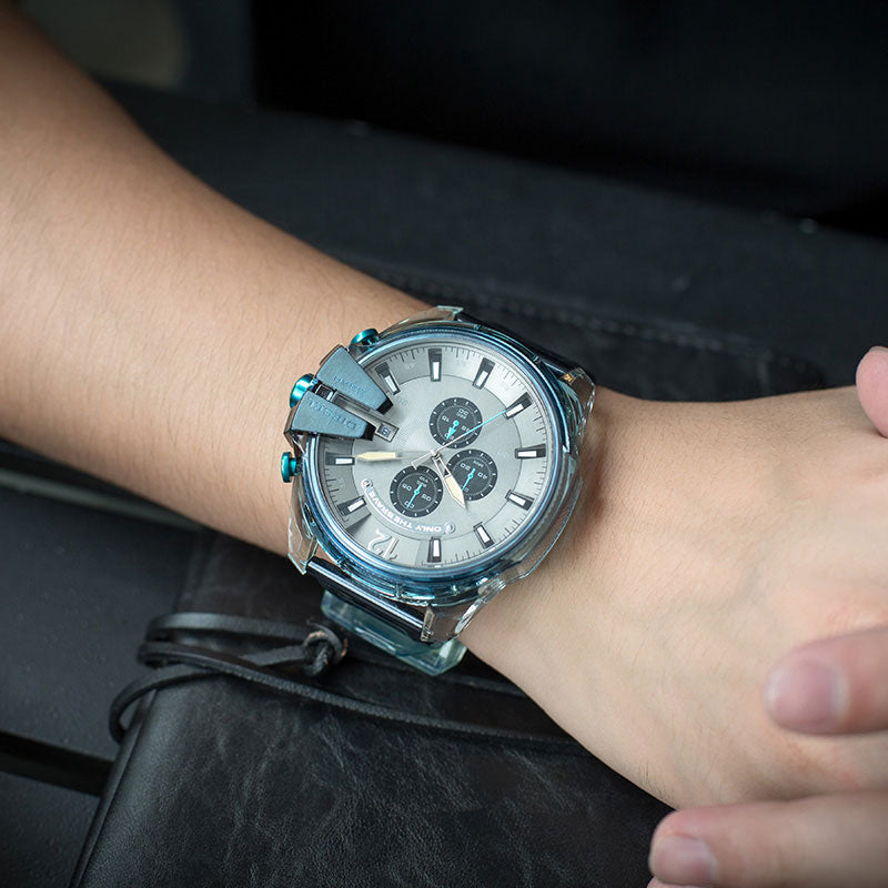 Diesel Mega Chief DZ4487 watch on wrist with blue case and chronograph subdials