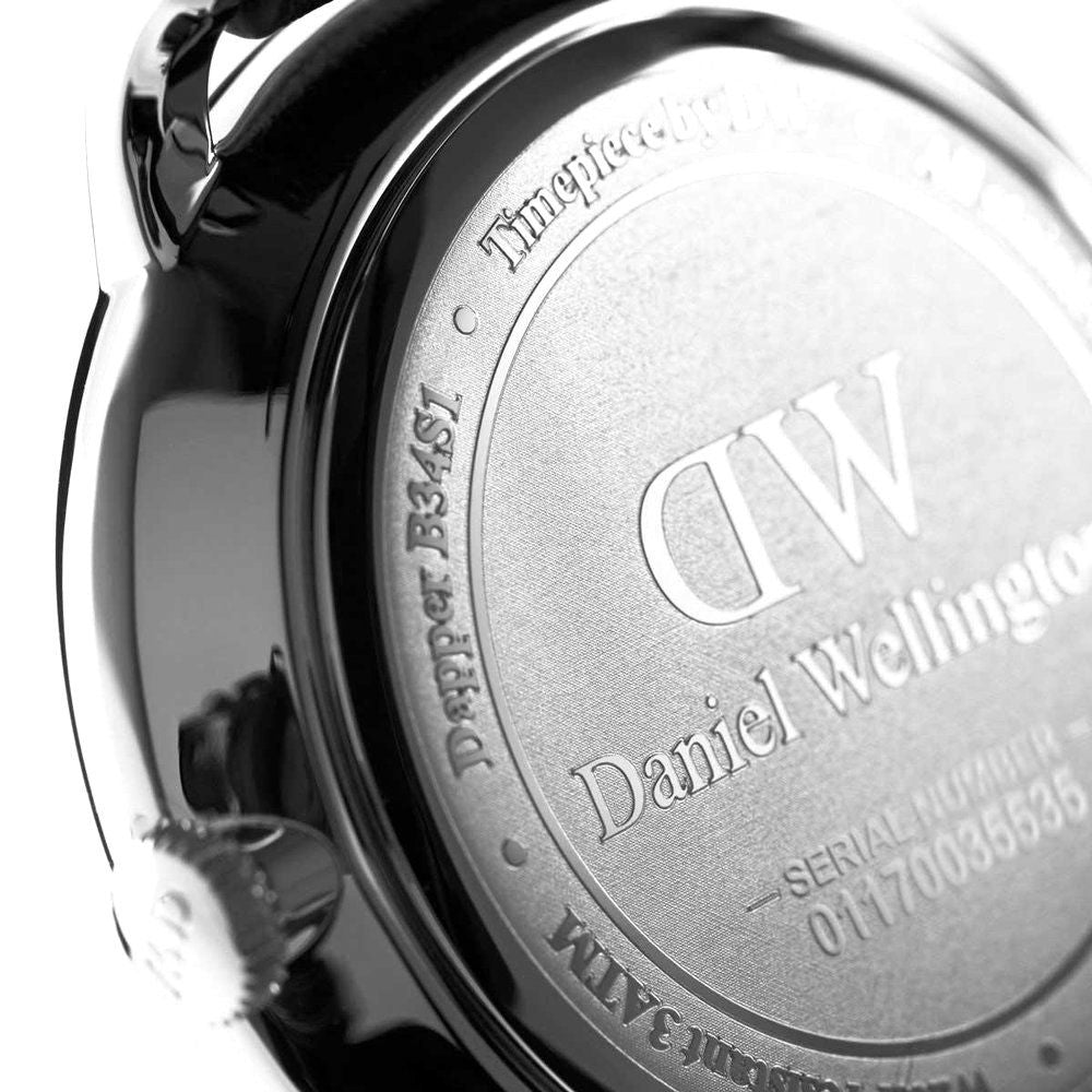 Case back of Daniel Wellington Dapper Cornwall showing engraved DW logo, serial number, and text
