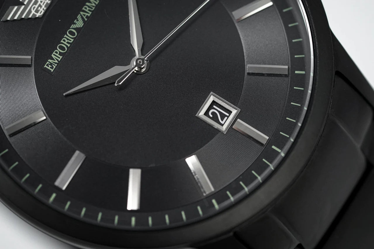 AR11079 angled view of black dial with white hands and hour markers