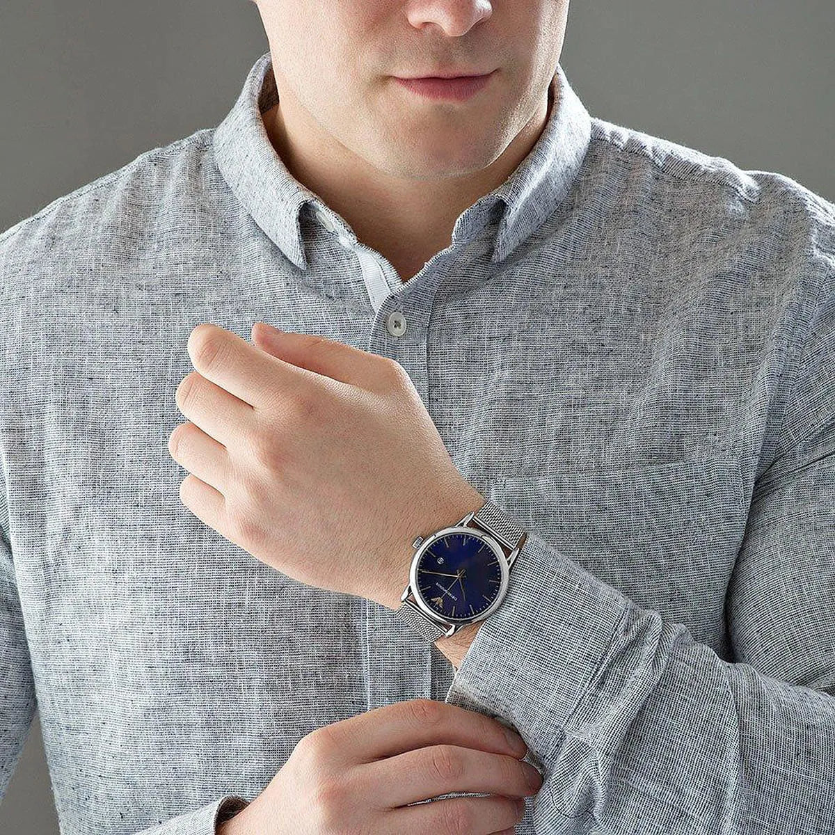 Emporio Armani AR11230 worn on wrist, silver mesh strap with blue dial