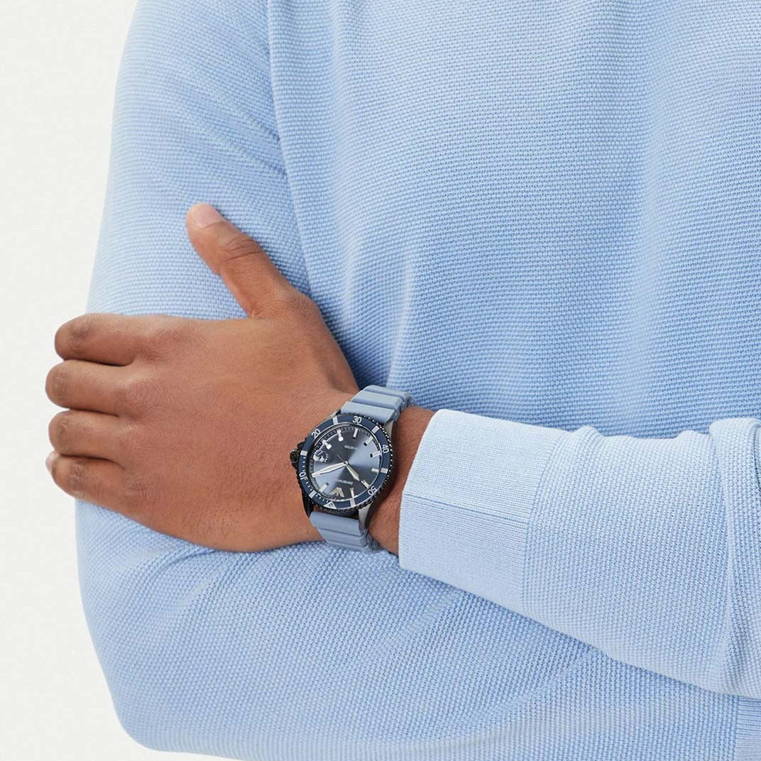 Emporio Armani Sea Explorer watch worn on wrist with blue dial visible