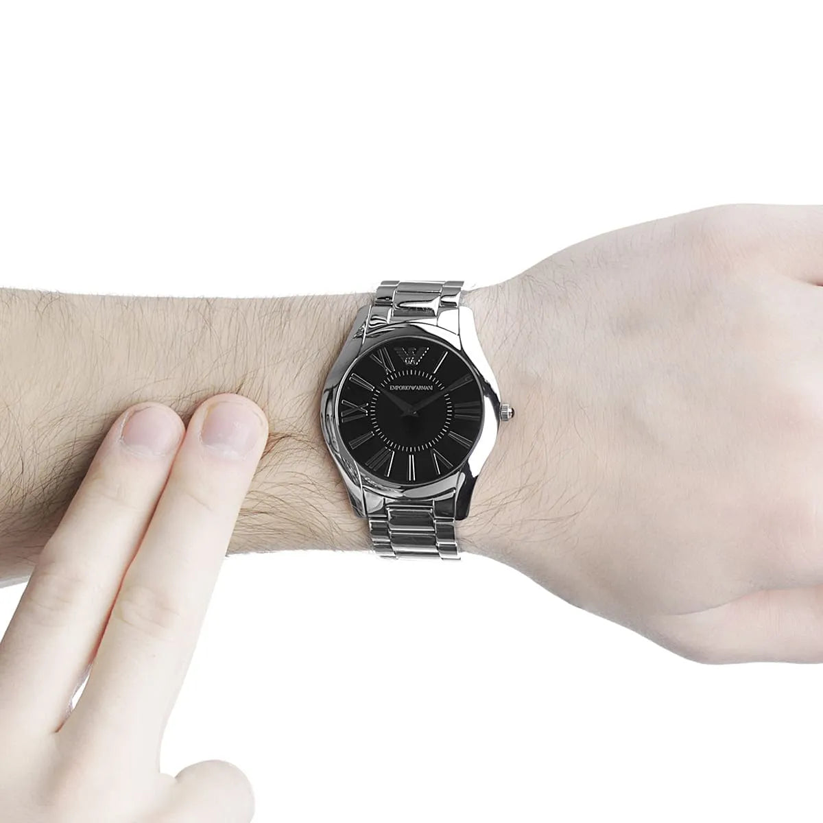 Emporio Armani AR2022 watch worn on wrist showing black dial and metal bracelet fit