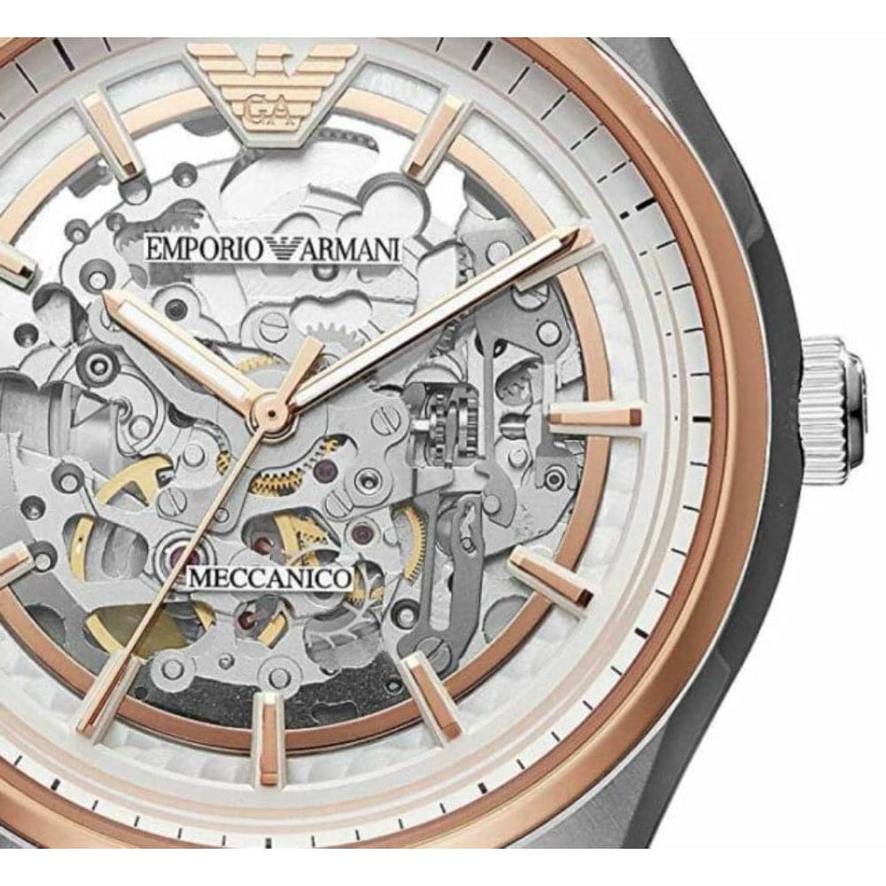 Close-up of AR60018 skeleton dial revealing visible mechanical movement and Meccanico branding