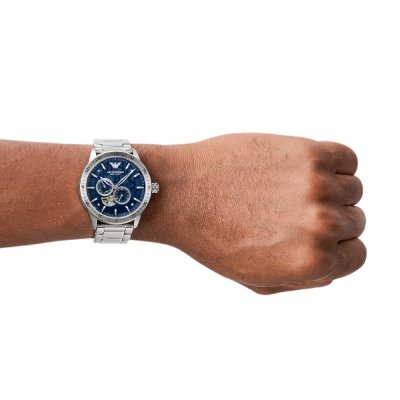 Emporio Armani AR60052 watch worn on wrist showing blue dial and stainless steel bracelet