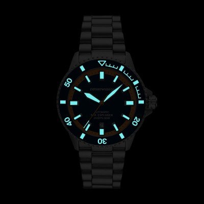 Close-up of Emporio Armani Sea Explorer AR60090 dial showing luminous hands and hour markers