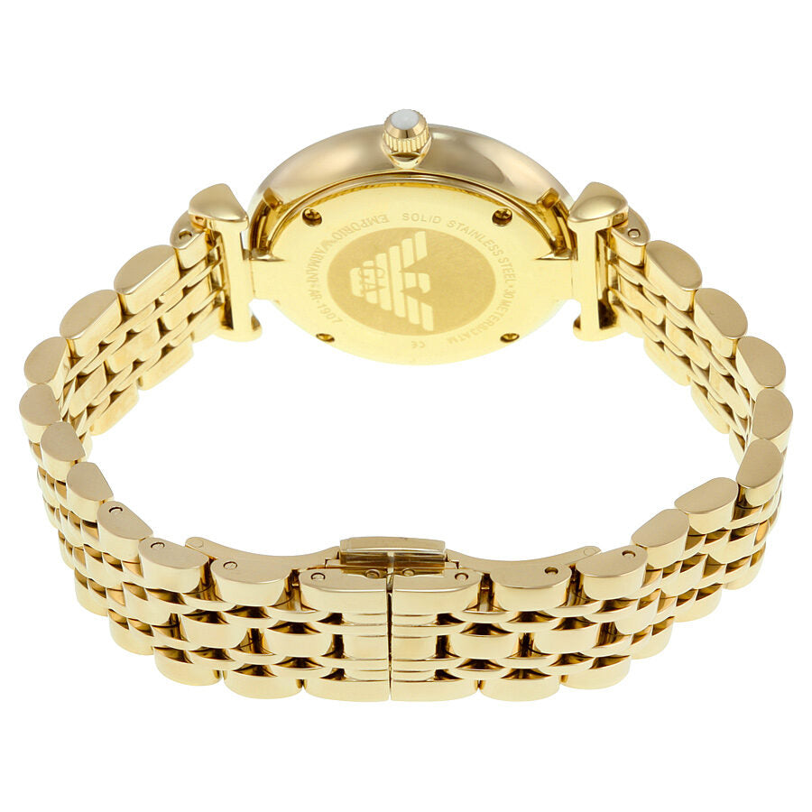 Gold-tone case back of Emporio Armani watch with logo and adjustable bracelet links visible