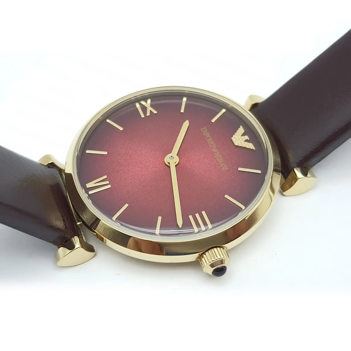 Dial detail of Emporio Armani Gianni AR1757 with burgundy face and gold Roman numerals