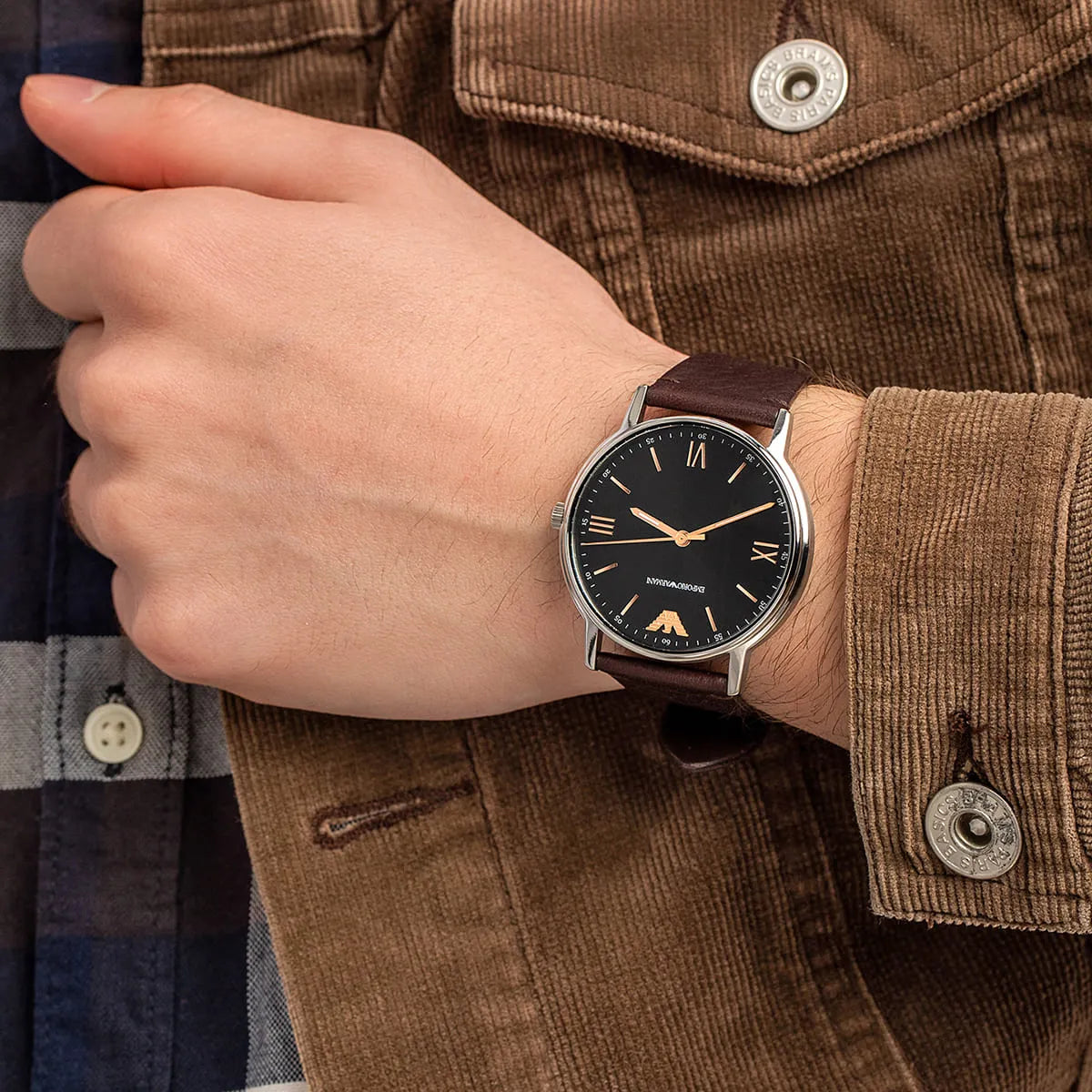 Emporio Armani Kappa AR11153 watch worn on wrist with stainless steel case and brown leather strap