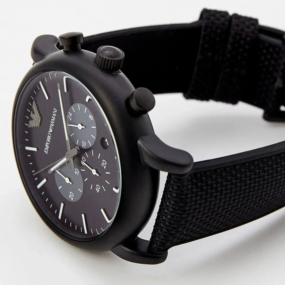 Side view of Emporio Armani Luigi AR11450 chronograph watch with black case and fabric strap