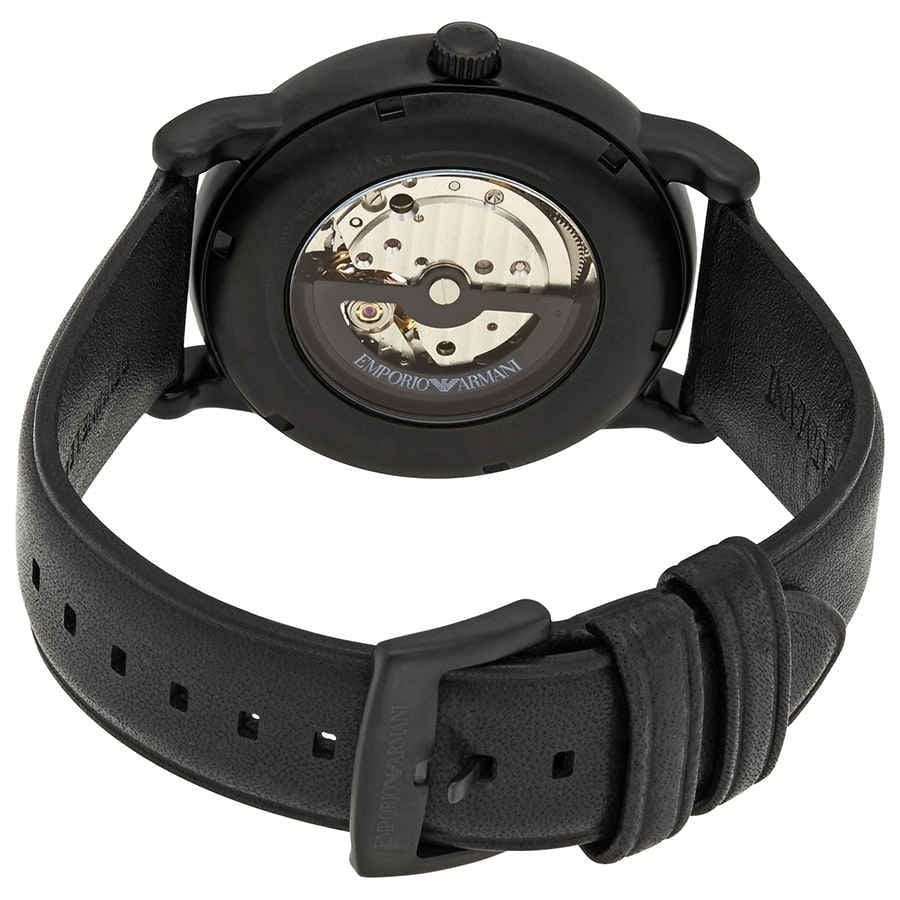Emporio Armani Luigi skeleton watch caseback showing automatic movement and rotor