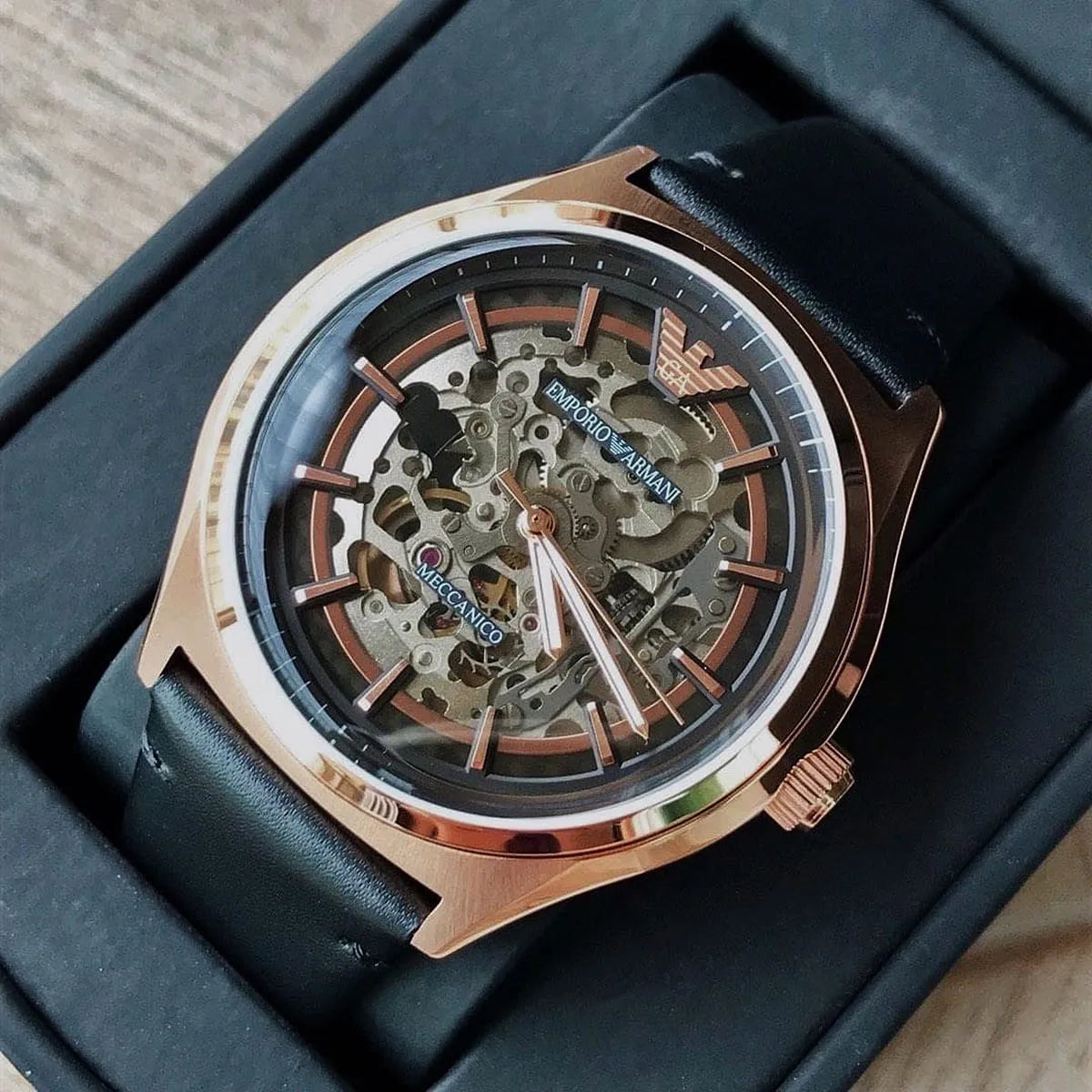 Close-up of Emporio Armani AR60004 skeletonized dial showing visible mechanical movement