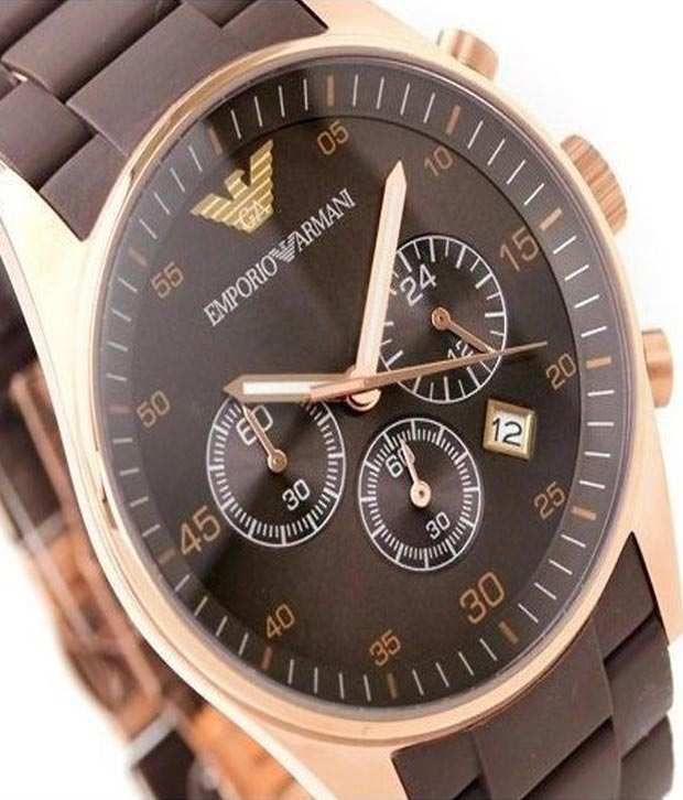Close-up of brown dial with Emporio Armani logo, chronograph subdials, and rose gold hands