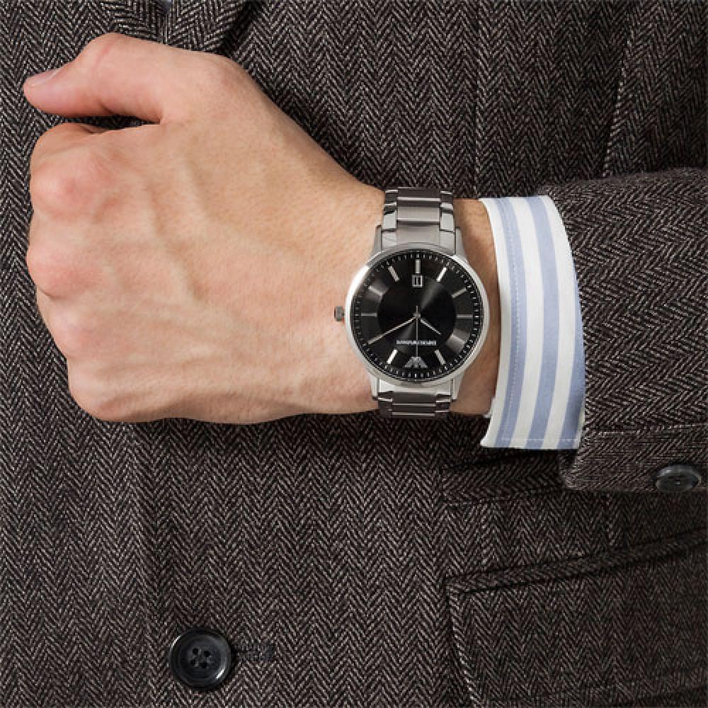 Emporio Armani Sportivo AR2457 men's watch worn on wrist with formal attire