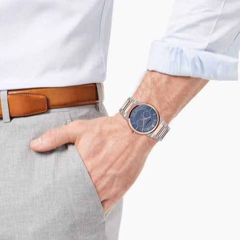 Ferragamo Salvatore sapphire blue dial watch worn on wrist showing two-tone steel bracelet