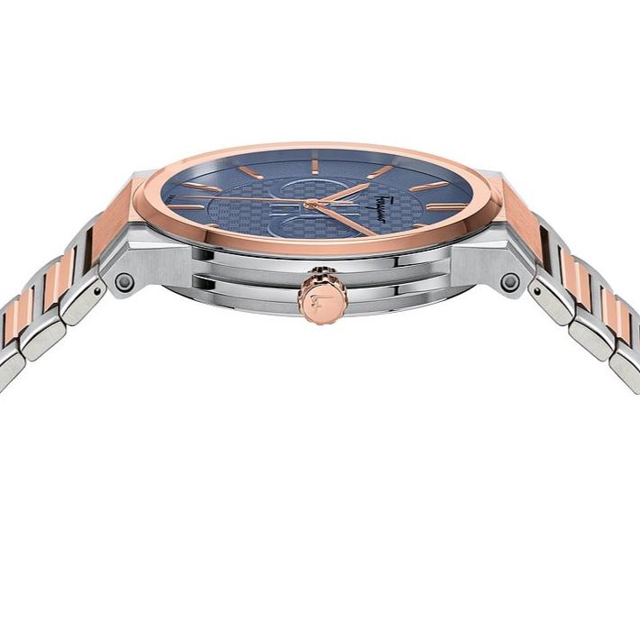 Side profile of Ferragamo Salvatore watch with sapphire blue dial and linked two-tone steel strap