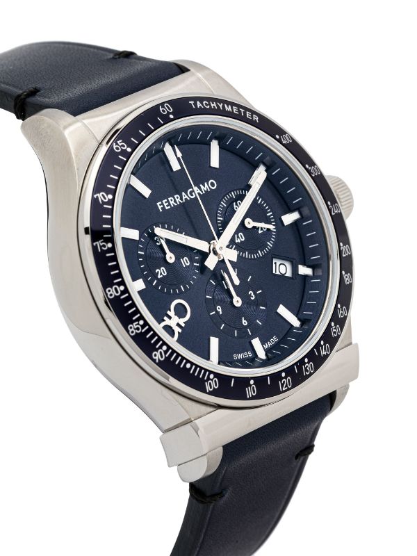 Angled view of Ferragamo watch on navy leather strap with blue dial and chronograph subdials