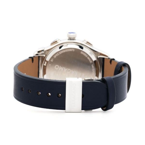Rear view of Ferragamo chronograph watch caseback with navy and tan leather strap