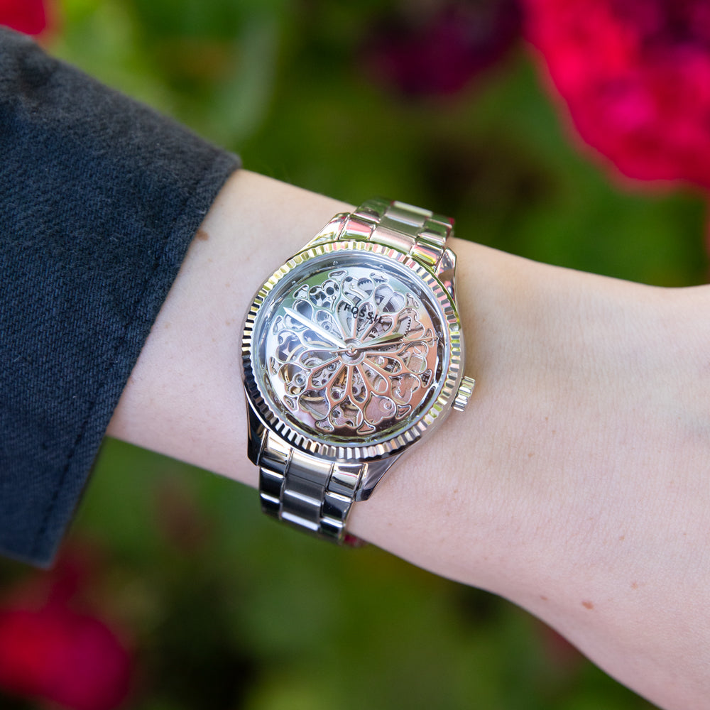 Fossil BQ3753 skeleton watch worn on wrist with stainless steel bracelet
