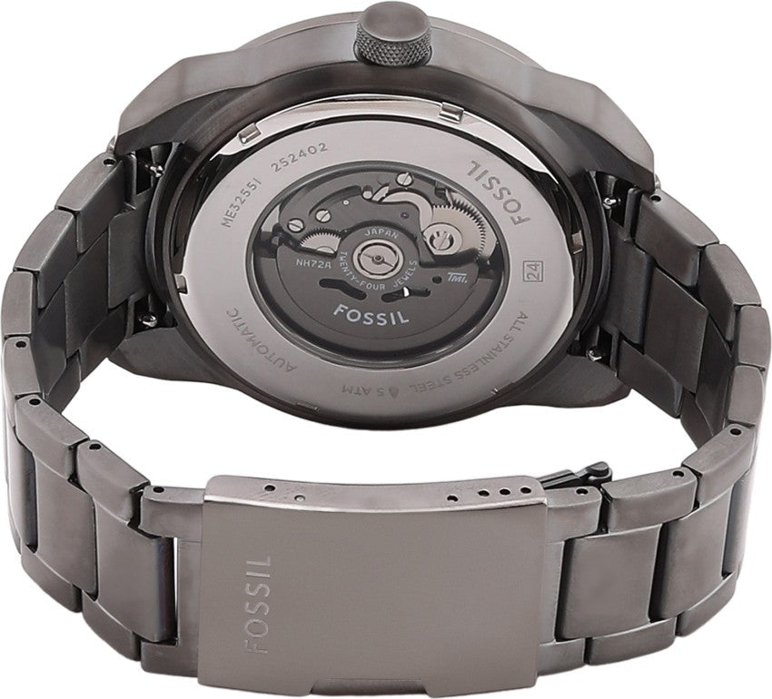 Fossil Bronson ME3255 caseback showing automatic movement visible through transparent display back
