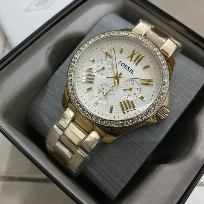 Fossil Cecile watch nestled in red presentation box with branded pouch
