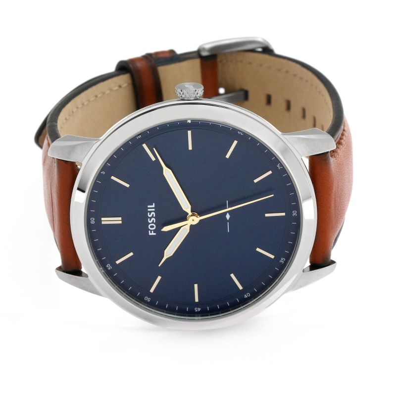 Fossil FS5304 watch from side view showing strap and case profile with navy dial