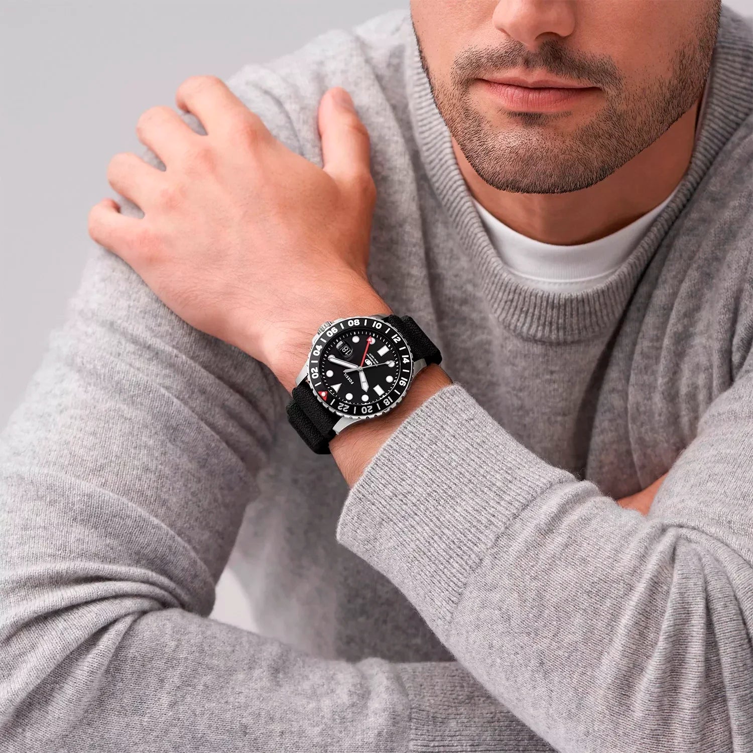Fossil GMT watch FS6036 on-wrist view with black dial and black leather strap