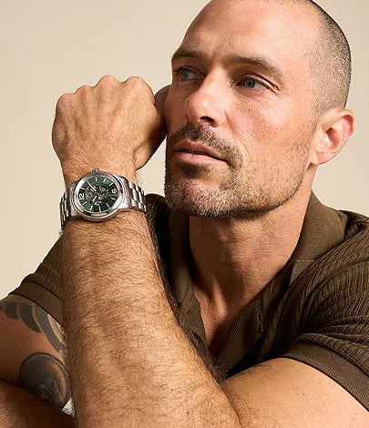 Fossil Heritage ME3262 automatic watch worn on man's wrist