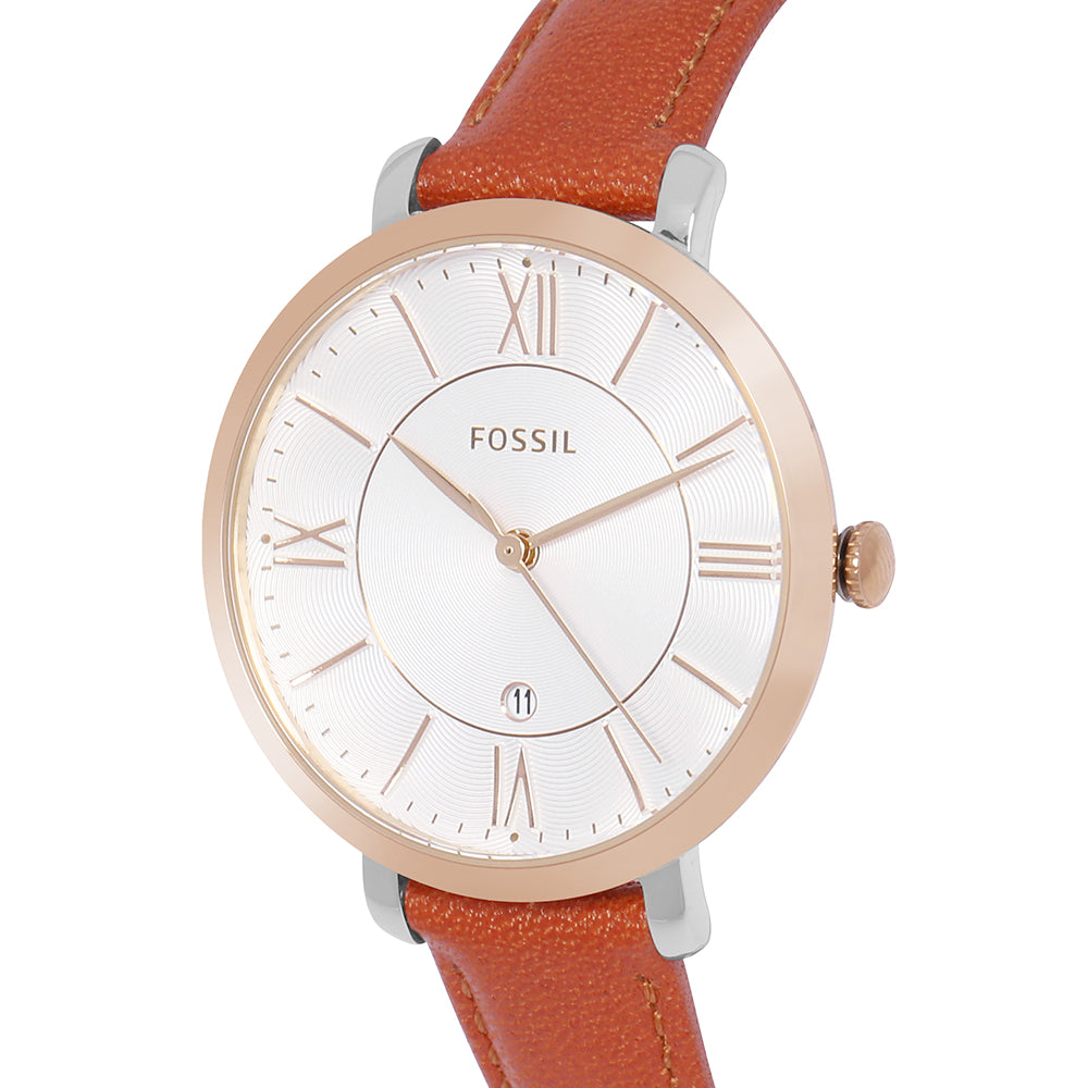 Close-up of Fossil Jacqueline dial showing Roman numerals, rose gold hands, and date window