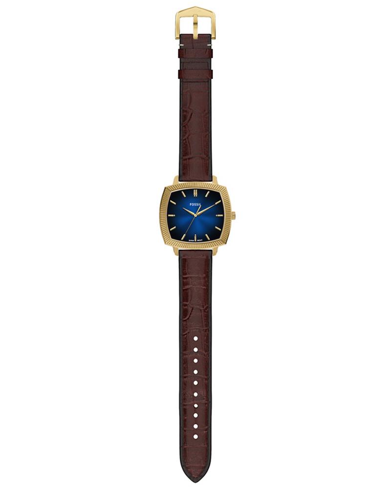 Angled view of Fossil Machine Luxe watch with blue dial and brown leather strap