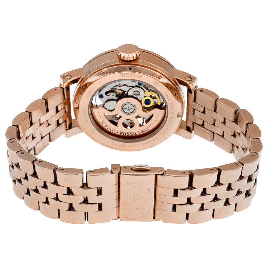 Fossil Original Boyfriend rose gold skeleton watch caseback showing automatic movement