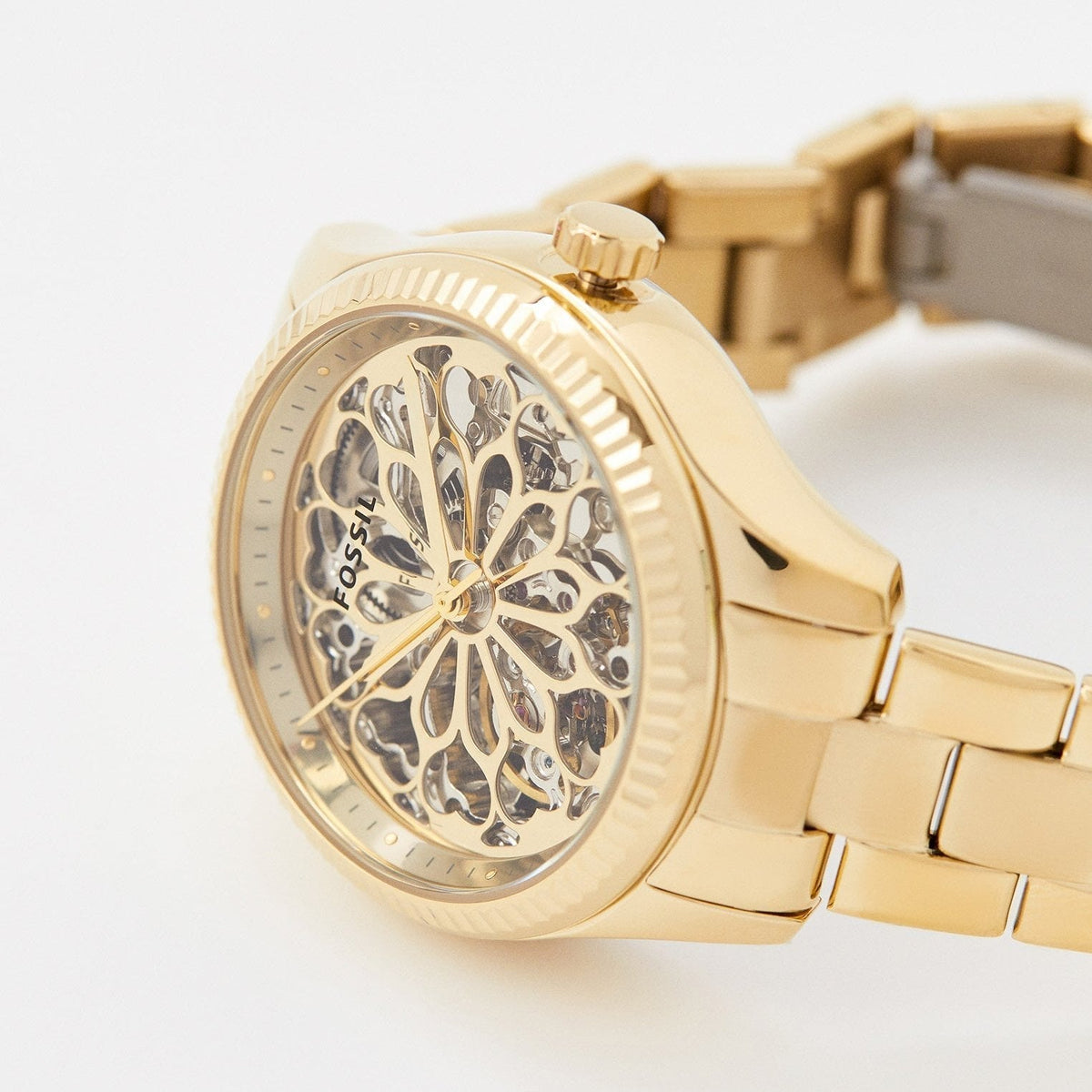 Fossil Rye automatic skeleton watch with visible internal mechanism and fluted bezel