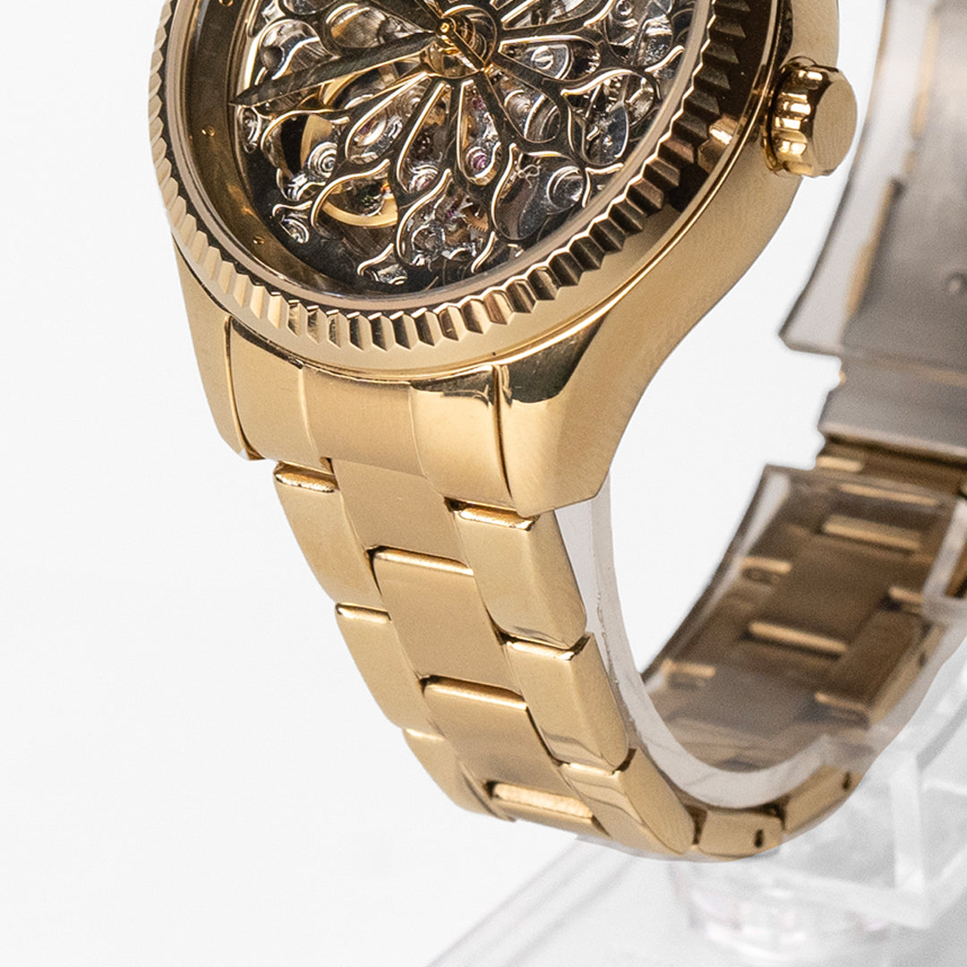 Fossil Rye watch side angle view showing case depth and gold steel bracelet