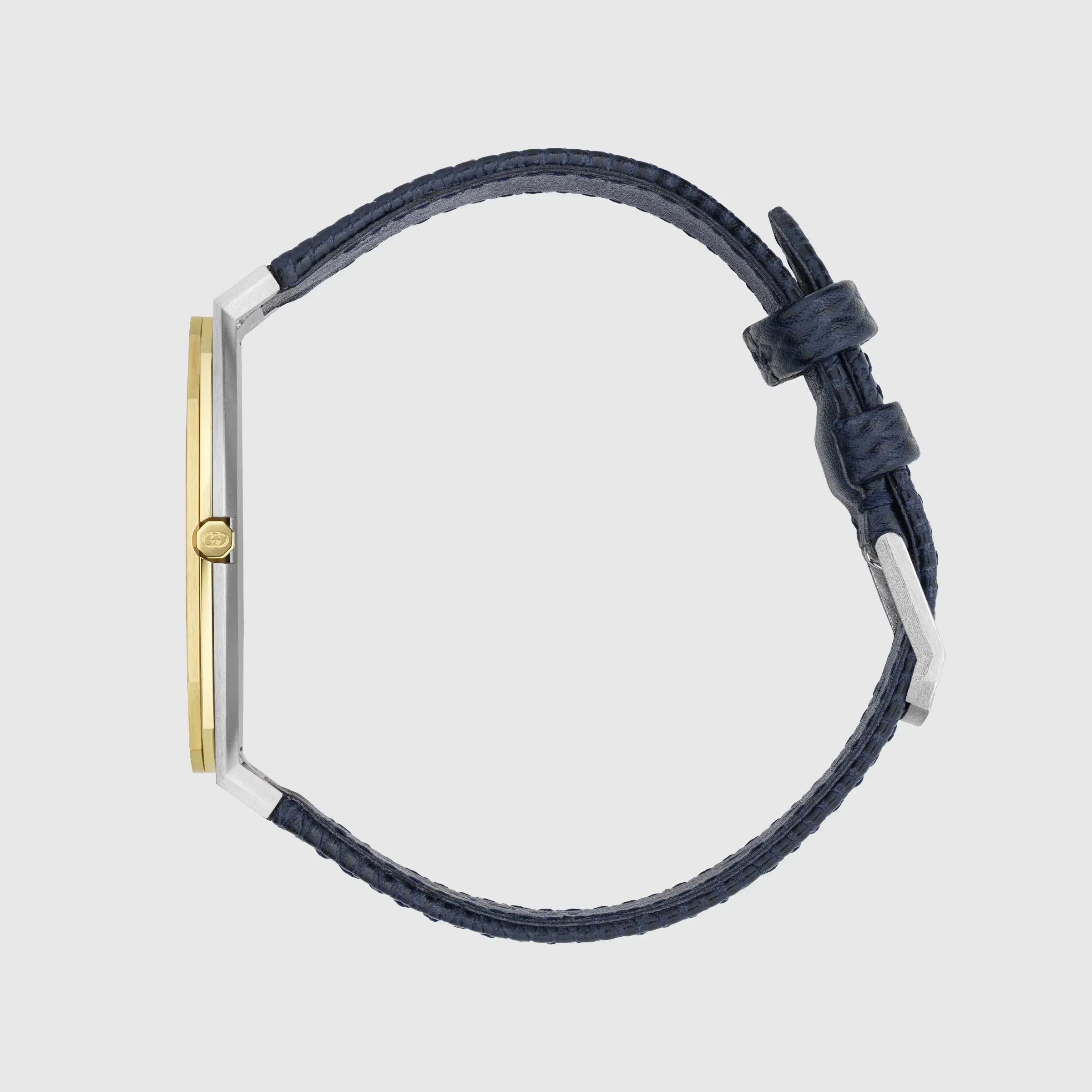 GUCCI 25H watch side view showing gold plated case and navy leather strap