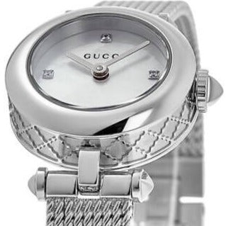 Gucci Diamantissima dial detail showing white face and diamond hour markers